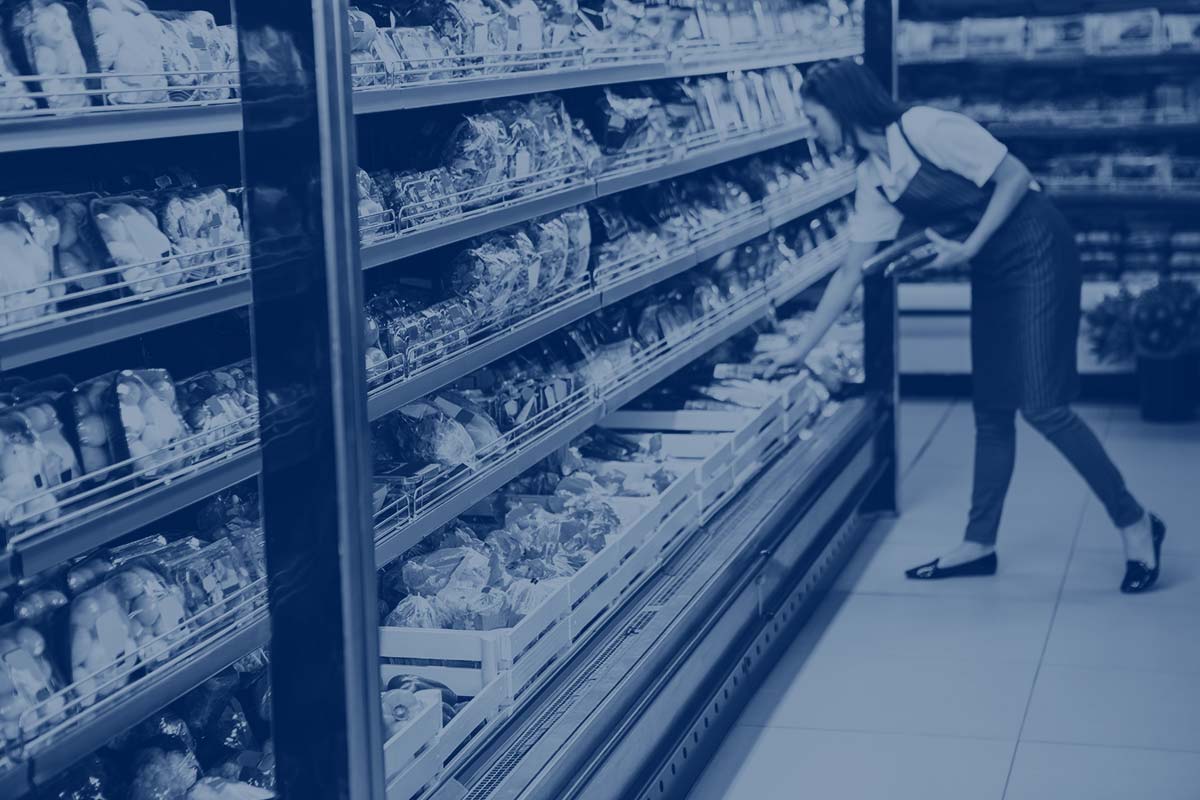 woman stocking groceries