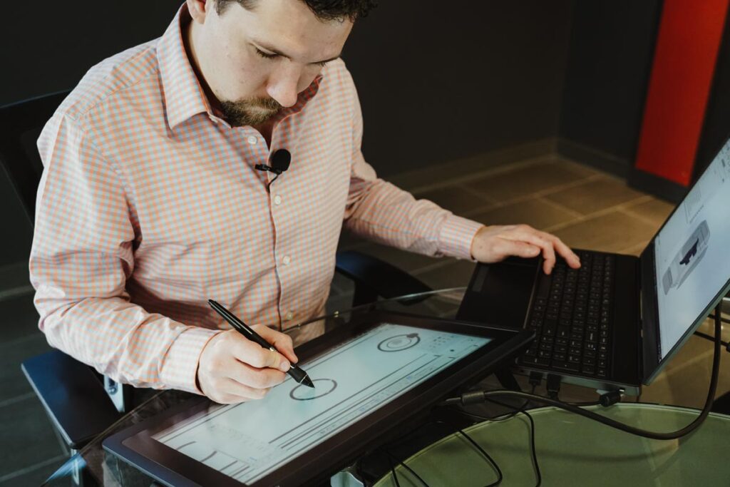 Designer drawing on tablet