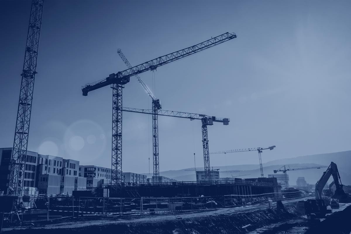 construction cranes over job site